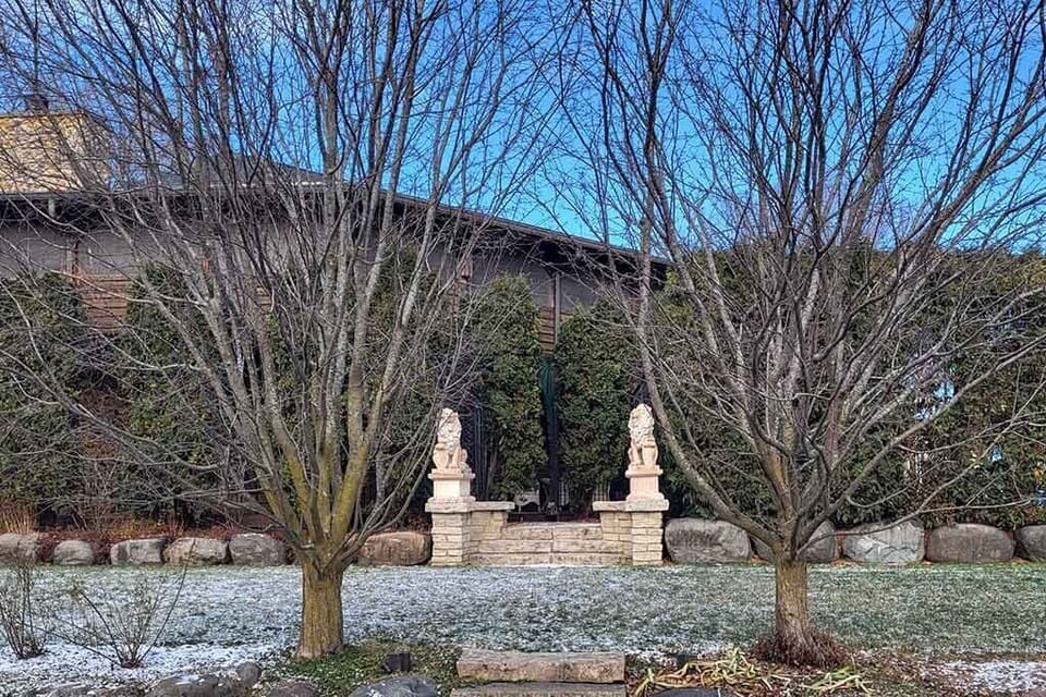 Two of the Four Lion Statues