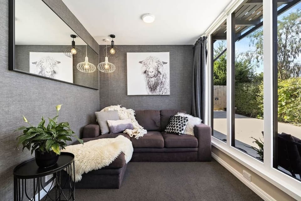Open plan studio living area at Walk to Town 41B Alpine Chalet Queenstown