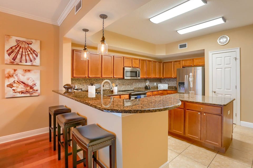 Fully Equipped, Updated Kitchen with Granite Counter Tops and Stainless Steel Appliances