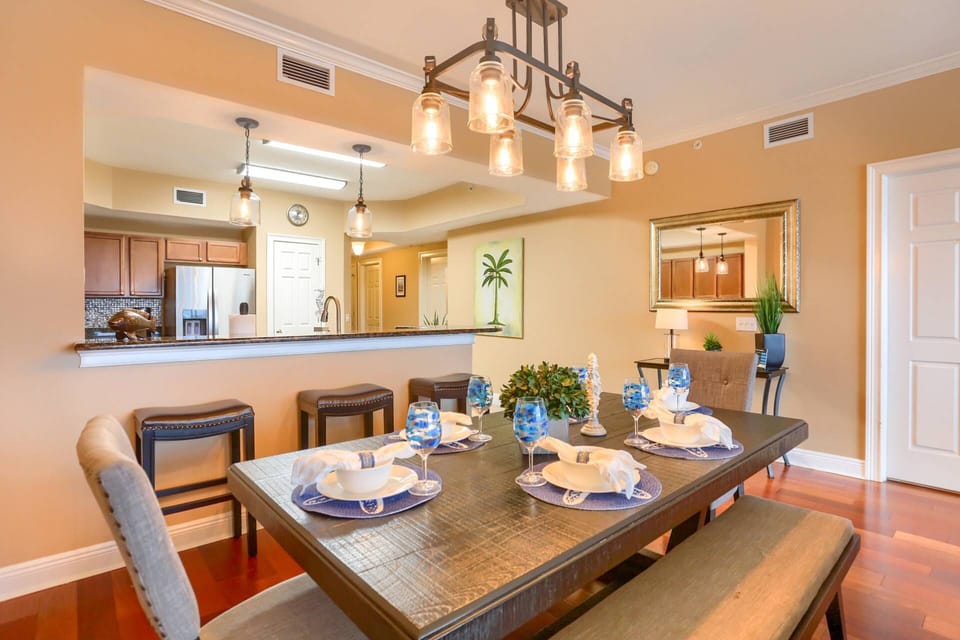 Dining Table with Seating for up to 6; Additional Seating for 3 at the Breakfast Bar