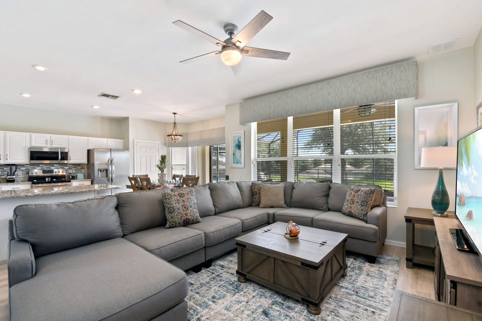 Big and Comfortable sectional and 65-inch TV - perfect for movie nights!