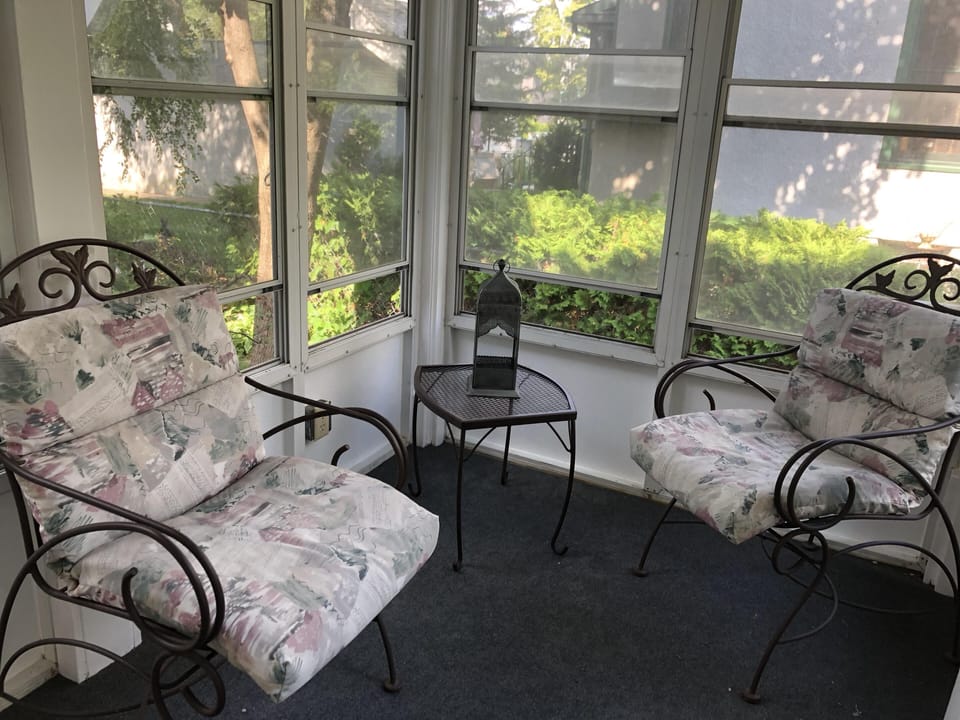 Attached screened porch for your private use.