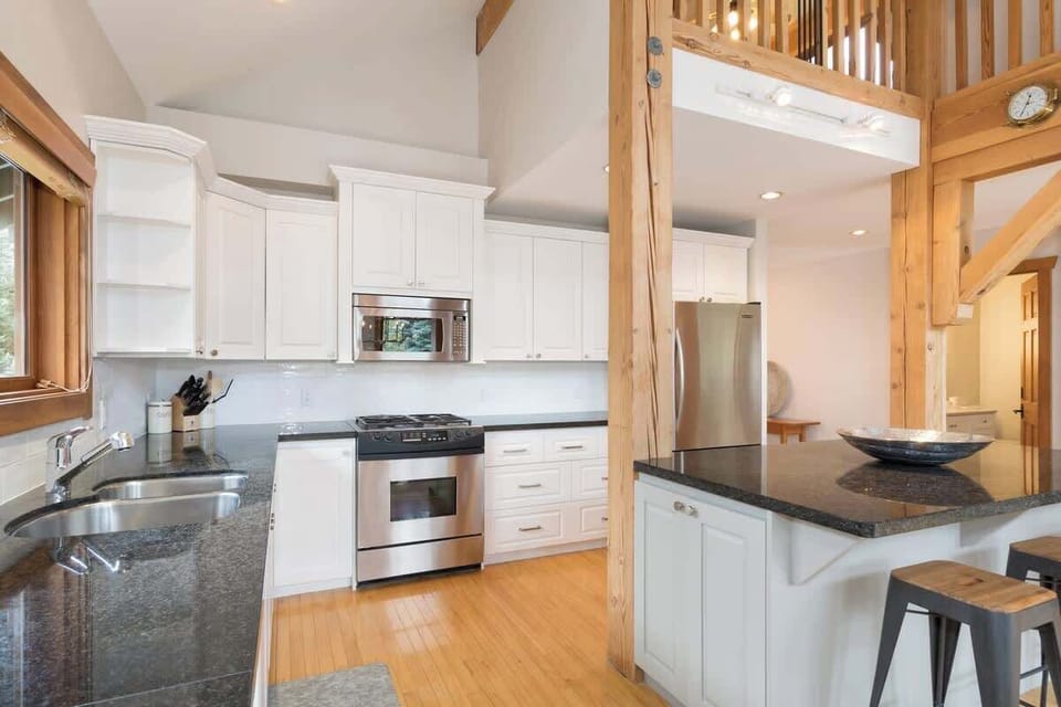 - Modern kitchen with granite counters and sleek stainless finishes  
- Bright open space ideal for preparing hearty mountain meals  
- Fully equipped setup perfect for families and food lovers  