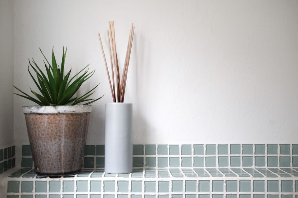 Toilet shelf and decor.