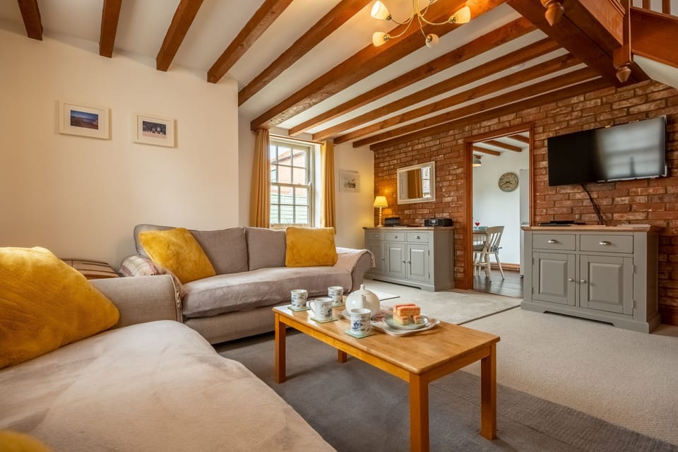 Ground floor: The sitting room with comfortable seating for four