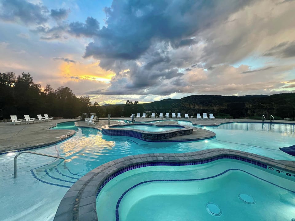 Relax after an adventure filled day in our new resort pool with a lazy river and 2 hot tubs.  Our Pool sits high on the hill overlooking the valley below with beautiful sunset views in the evening!