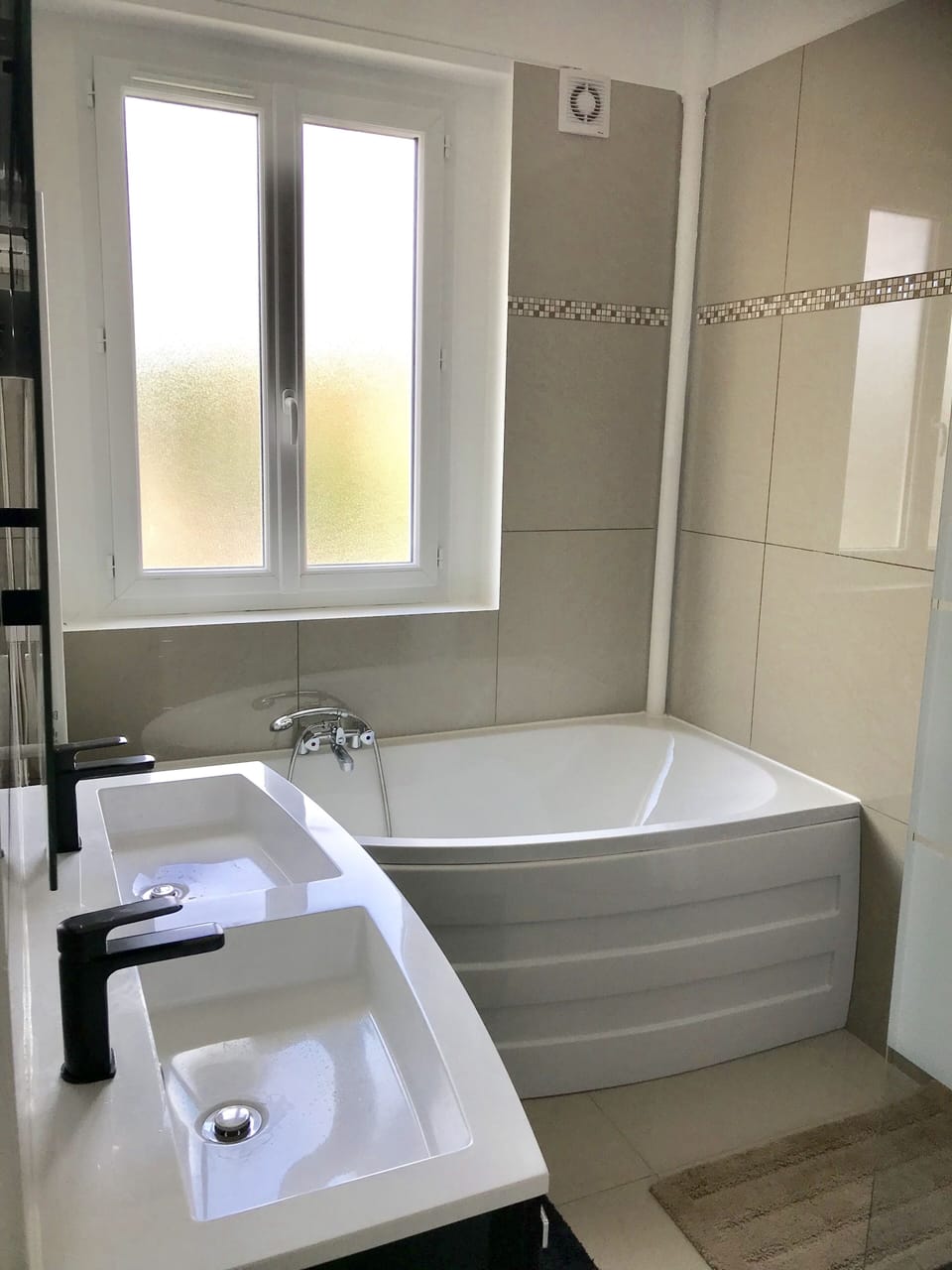 A smart bathroom with italian shower, bath tub, double sink 