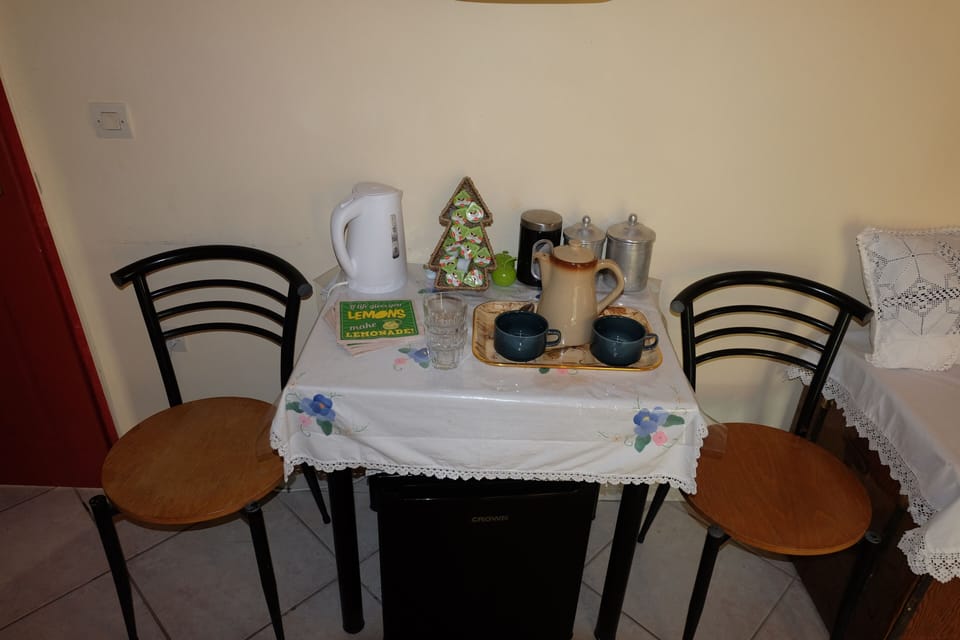 Coffee station with the fridge.