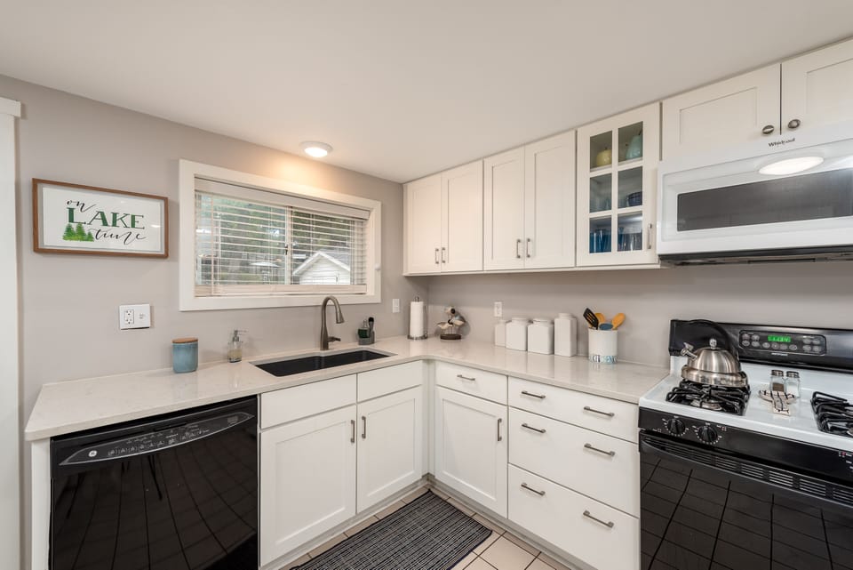 Well equipped kitchen with dishwasher and gas stove