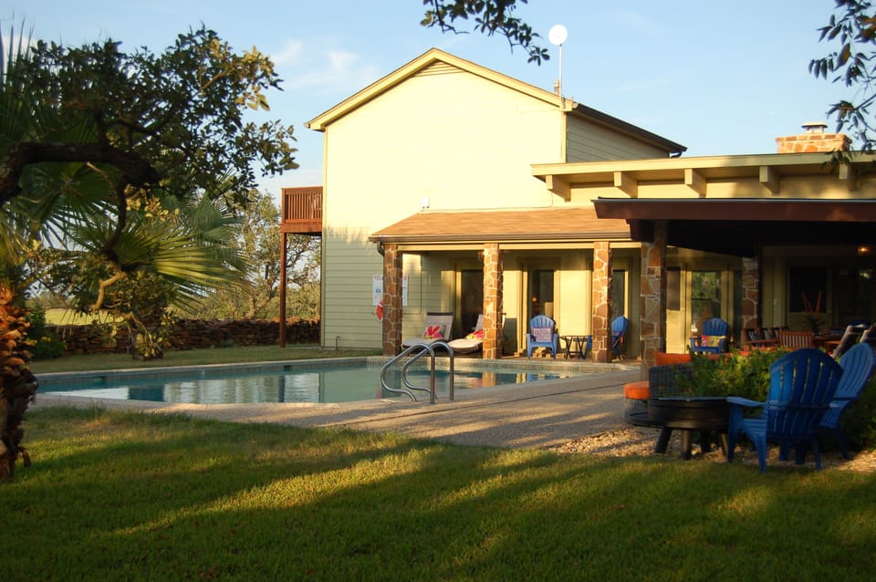 Pool Patio view with 100 acres in background. Pool Solar Heated March-mid Oct.