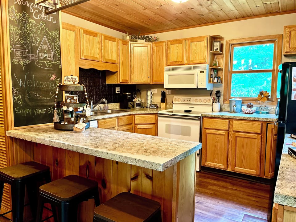 Small kitchen but we provide pots, pans, dishes, & all tools you need to dine in