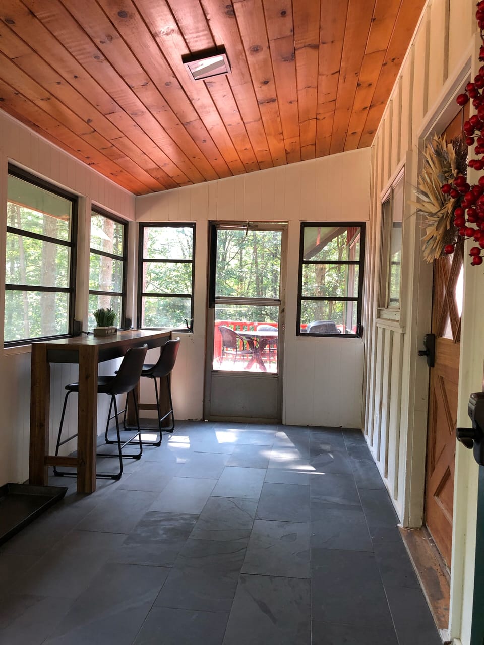 Entryway.  Mud room.  Enclosed screen porch.  Slate floor.