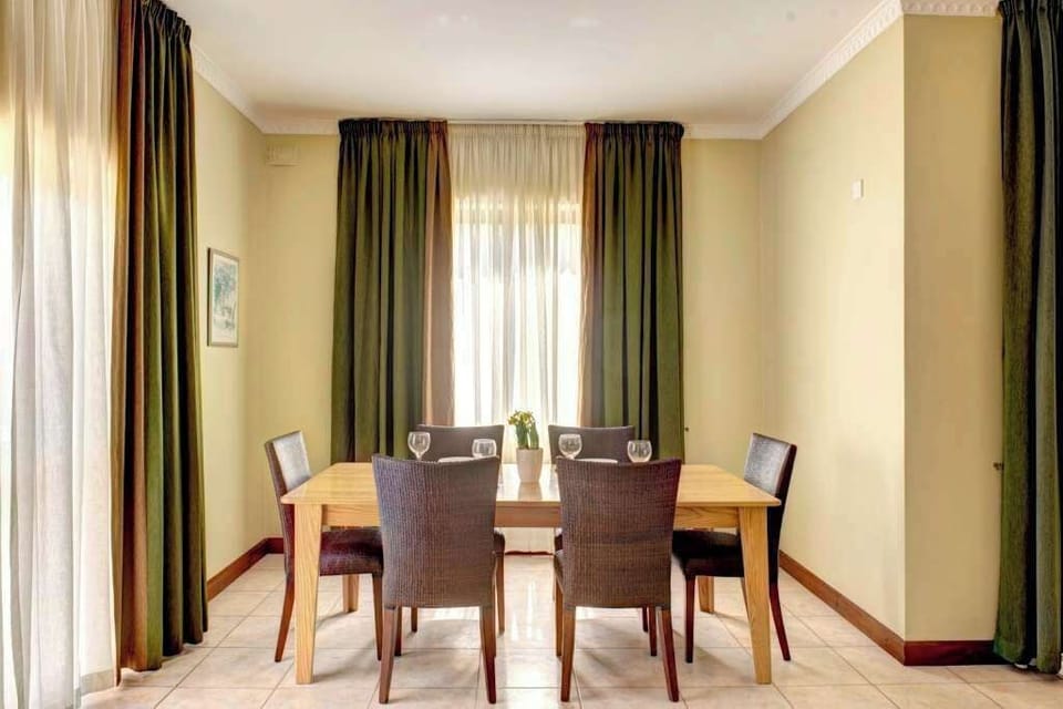 Enjoy delicious meals and great conversations around our elegant dining table.