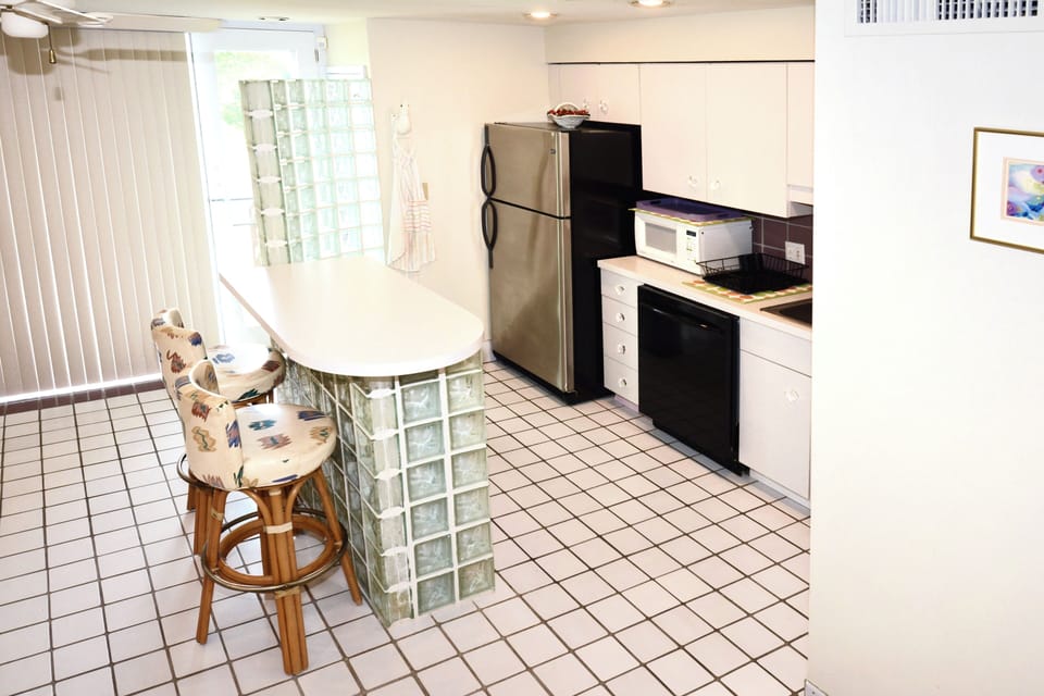 Enter through the front door into the kitchen/dining area!