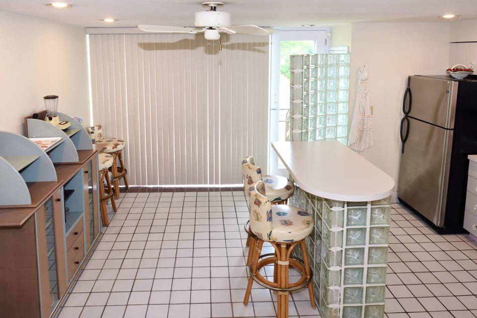 The island provides additional counter space for meal prep or grabbing a quick snack!