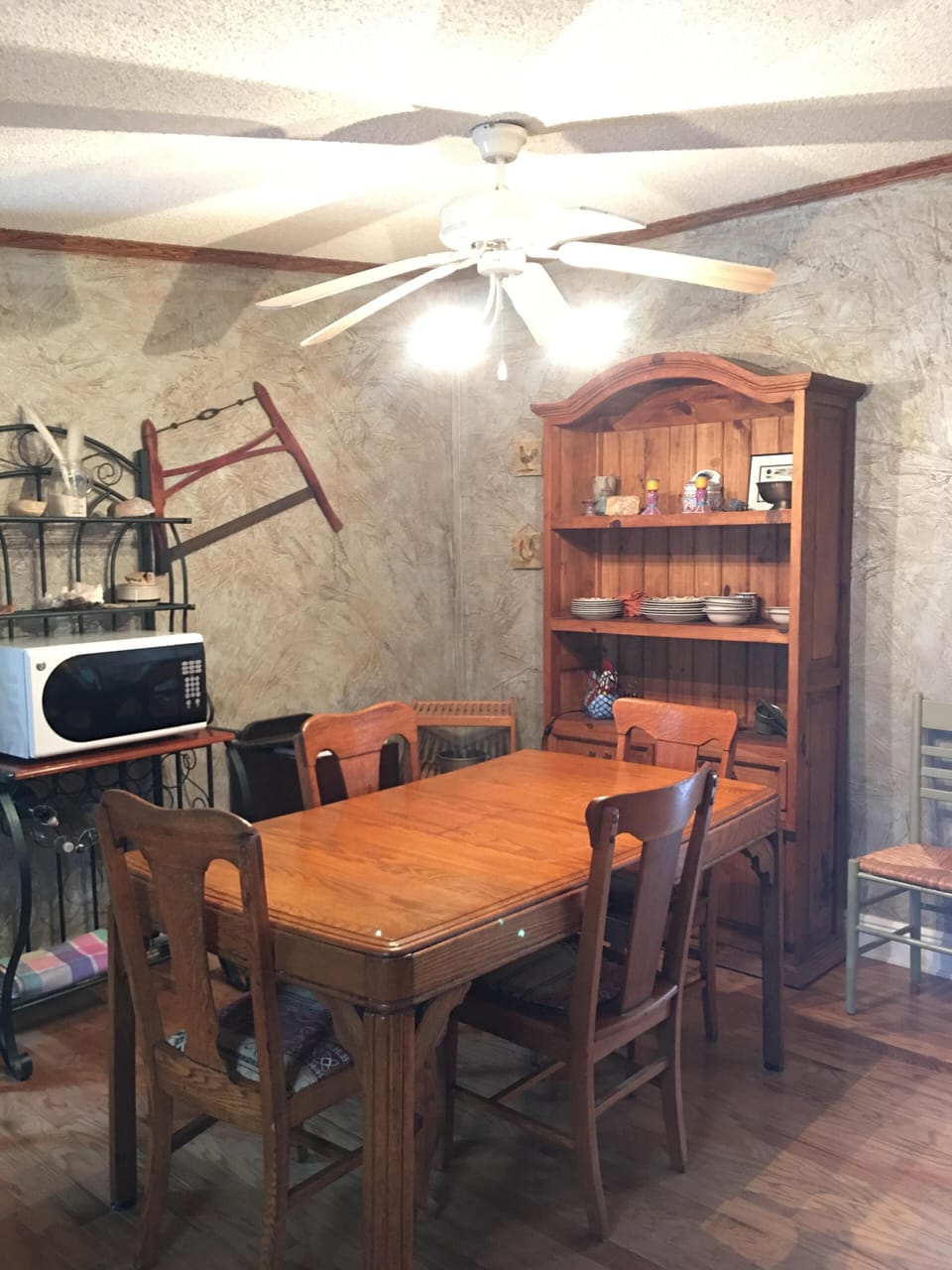 Lots of antiques on display in kitchen