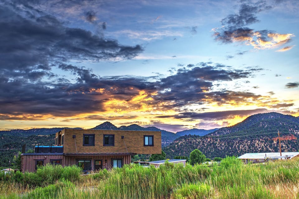 Picturesque sunset at Envase Casa with breathtaking views! 