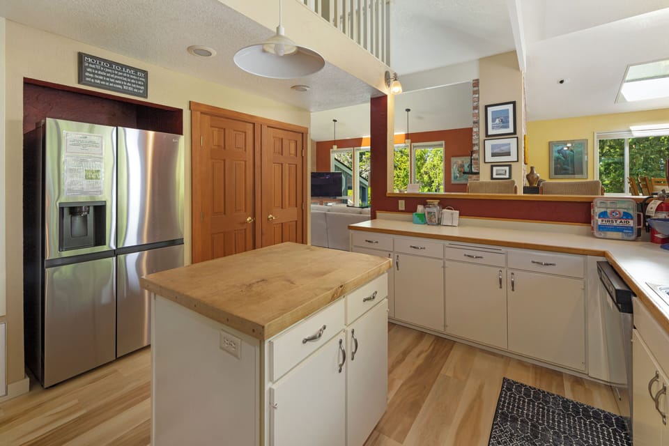 Fully stocked kitchen with new flooring