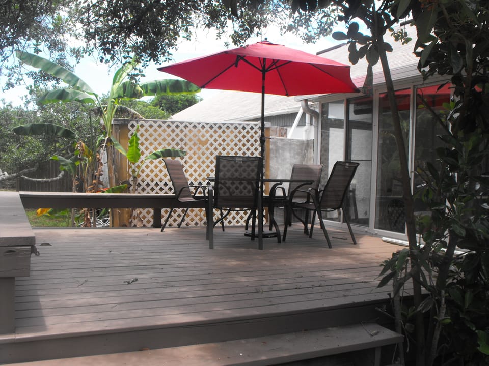 Shady deck under live oak trees