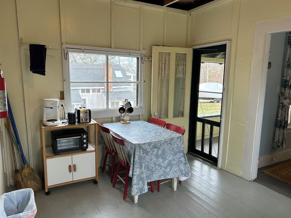 Kitchen table, door to wrap-around porch.
