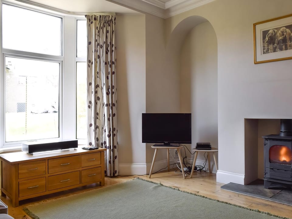 Warming wood burner within living room | Ash Grove, Skipton