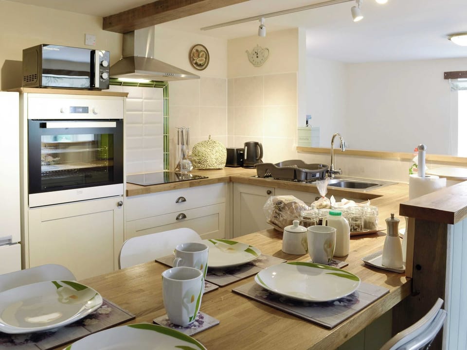 Well-equipped kitchen | Beech Cottage - Cysgod Y Coed Cottages, Llanrhaeadr, near Denbigh