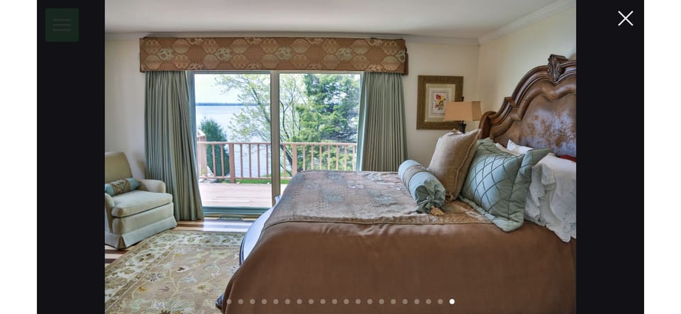 Master bedroom. Lake views. Walk out onto your private area of the patio. 