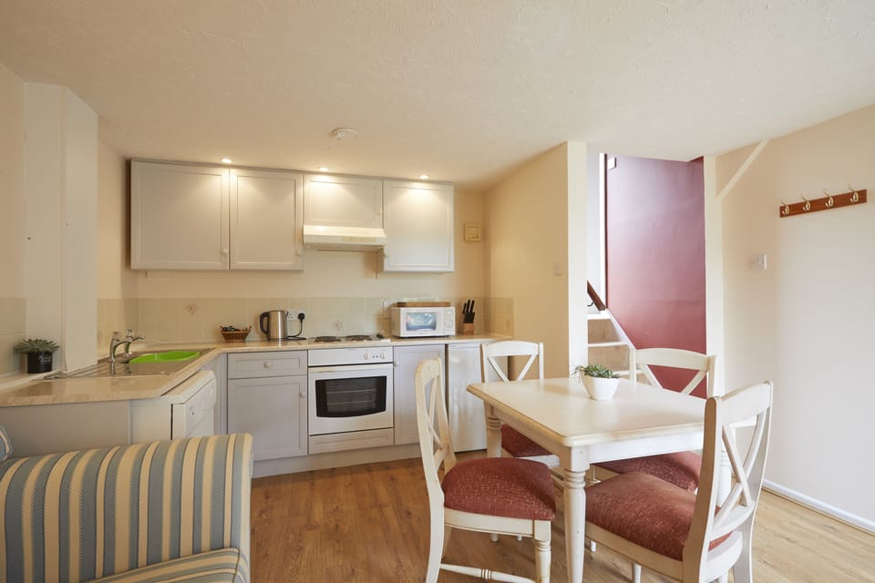 Kitchen, Lounge,Dining with door to decking terrace 