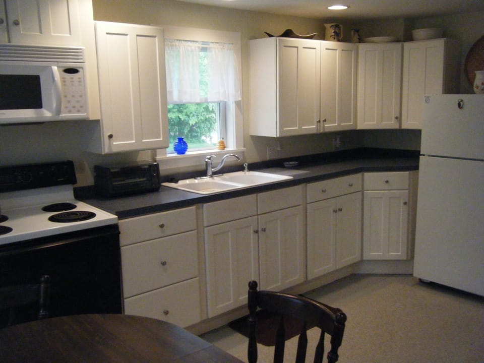 Roomy fully-equipped kitchen with modern appliances