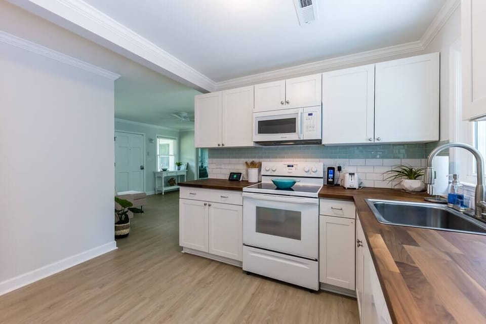 Spacious Kitchen opens to living room.