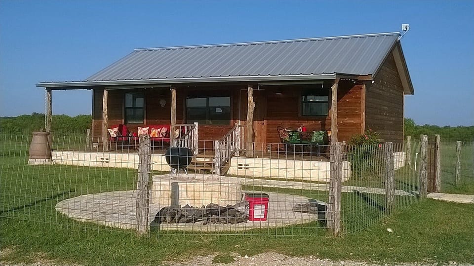 Pet-friendly fenced in front yard.