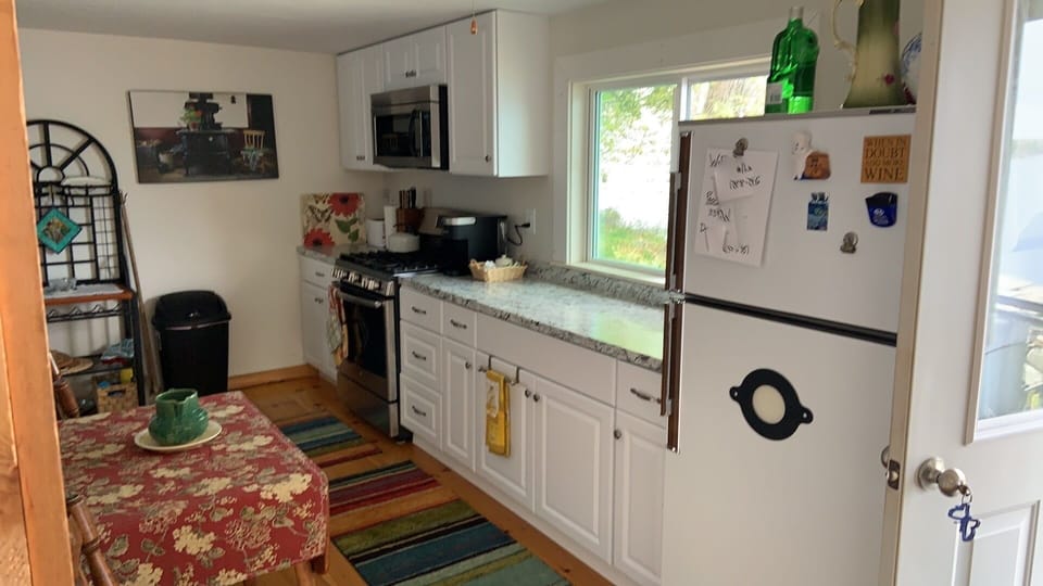 Gas stove, microwave, keurig machine, pots and pans 