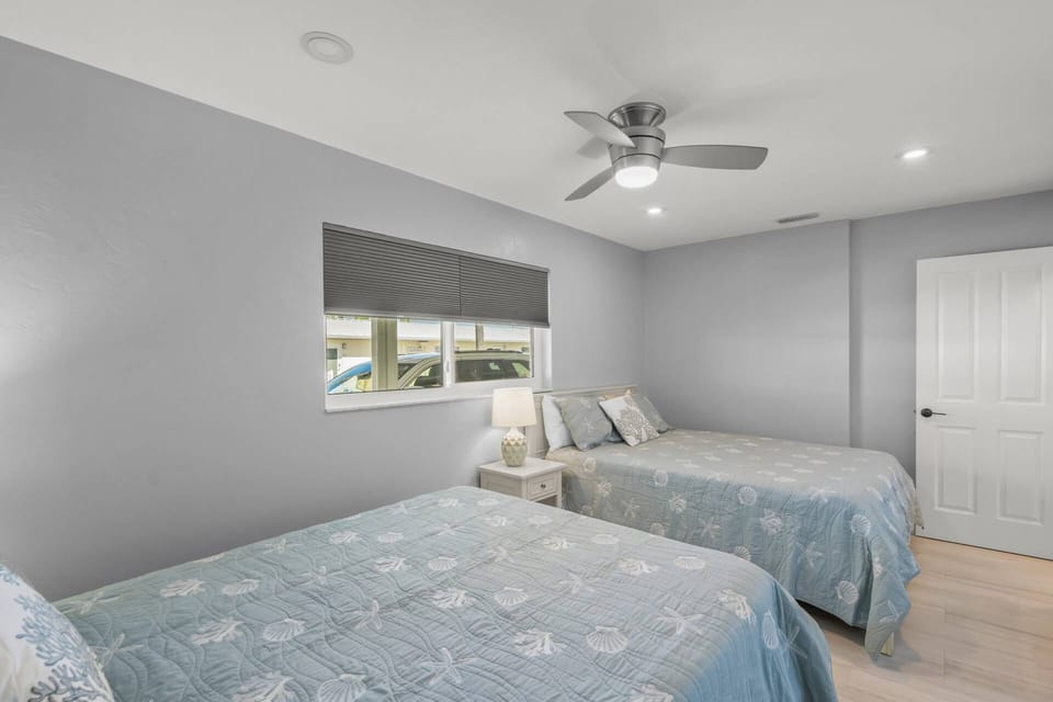 Features two queen beds, this guest room is perfect for hosting guests!