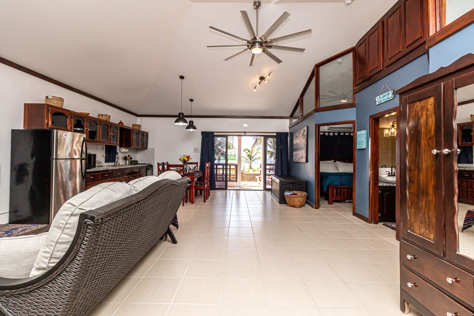 The home living area, dining room and kitchen leading to the back deck.