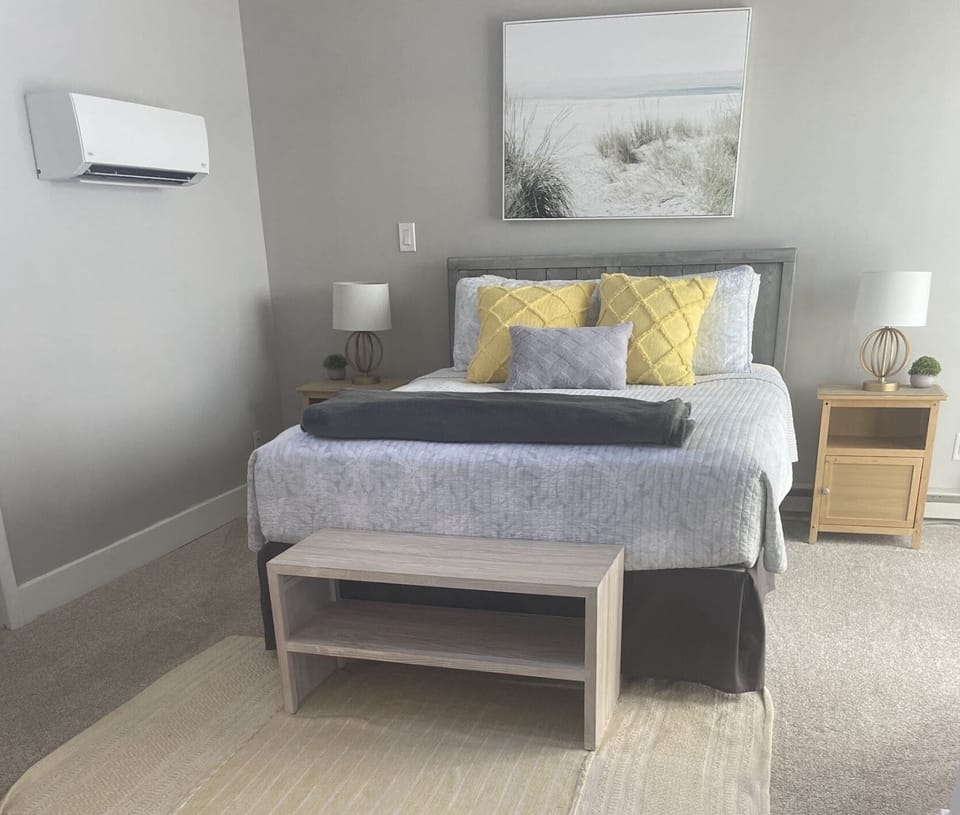 Upstairs Queen w/attached bath. Attached deck with breathtaking views. 