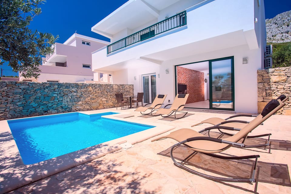 Nice salty water pool and pool area furniture.