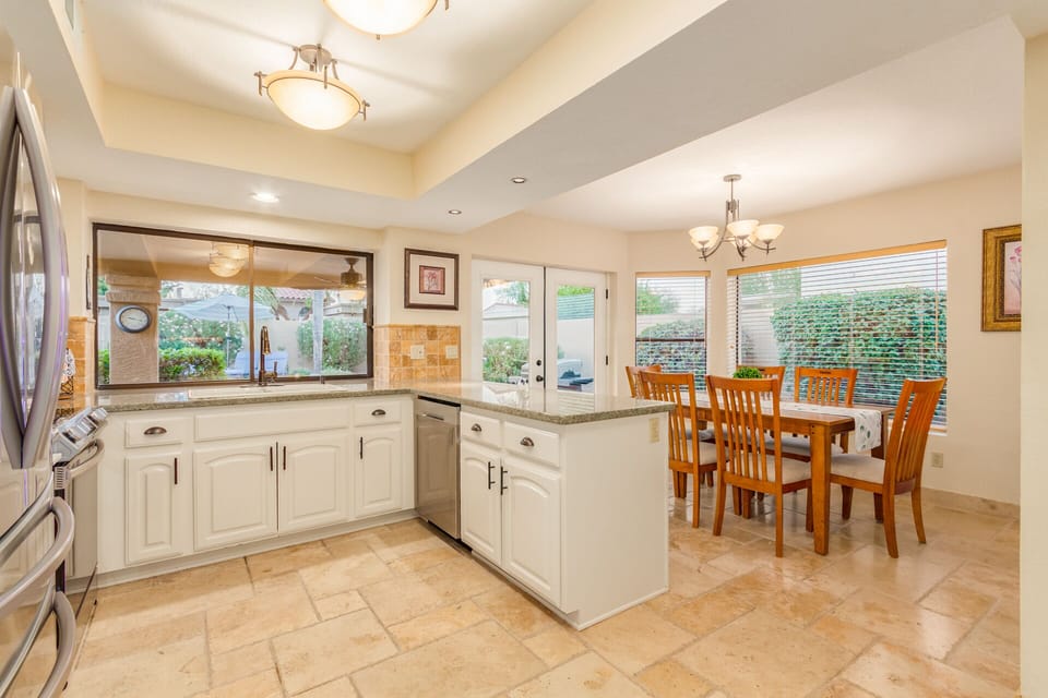 Bright, open kitchen overlooking yard!