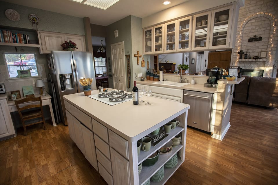 Kitchen view looking into living area.