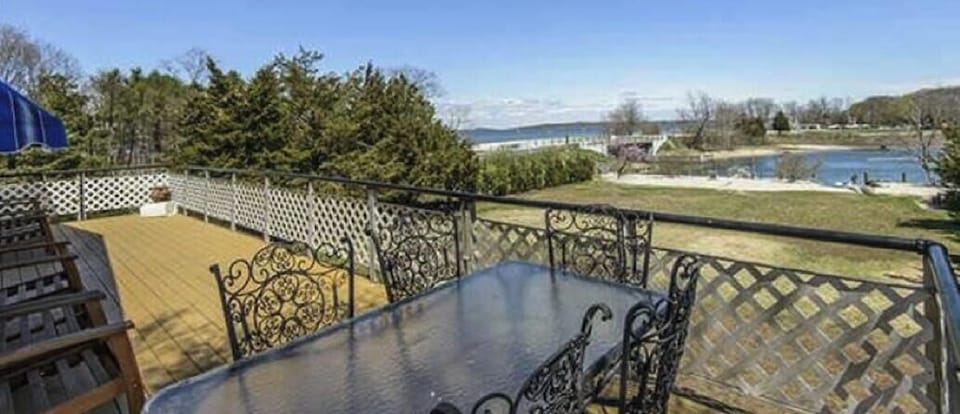 Back porch with additional seating and water views!