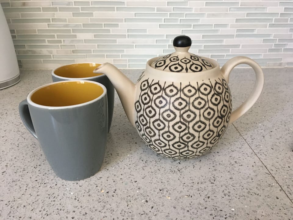 Tea set.  Real quartz countertops.