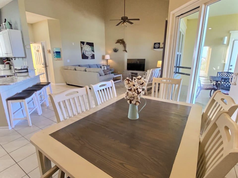 New dining table seats 6 and there is room for 3 more at the kitchen bar