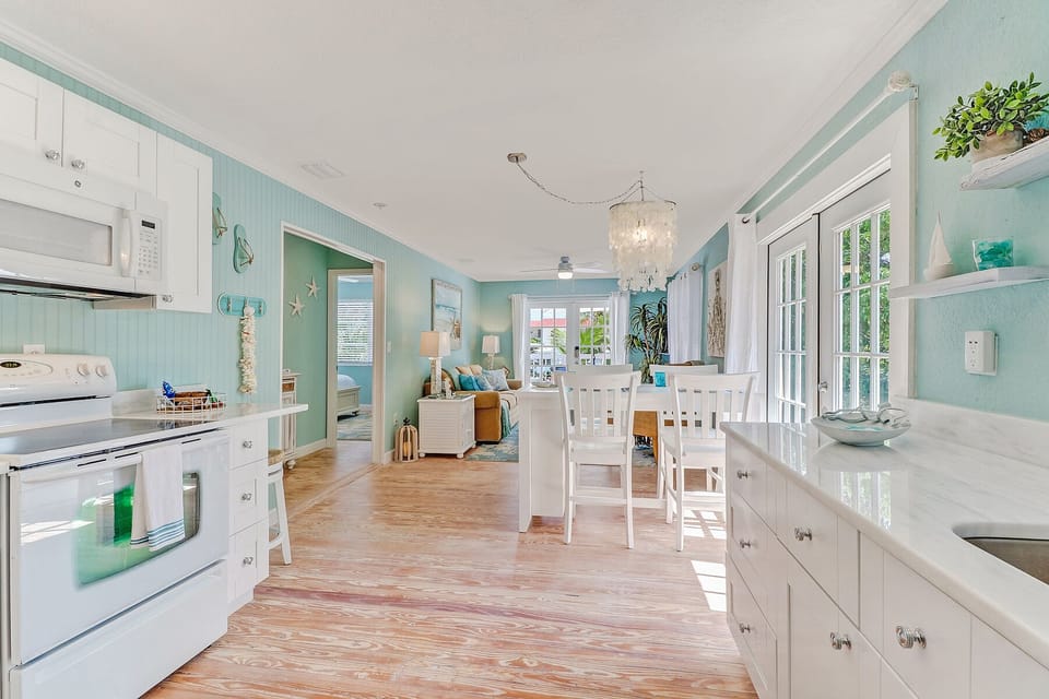 Overall view from back of kitchen to front entry doors
