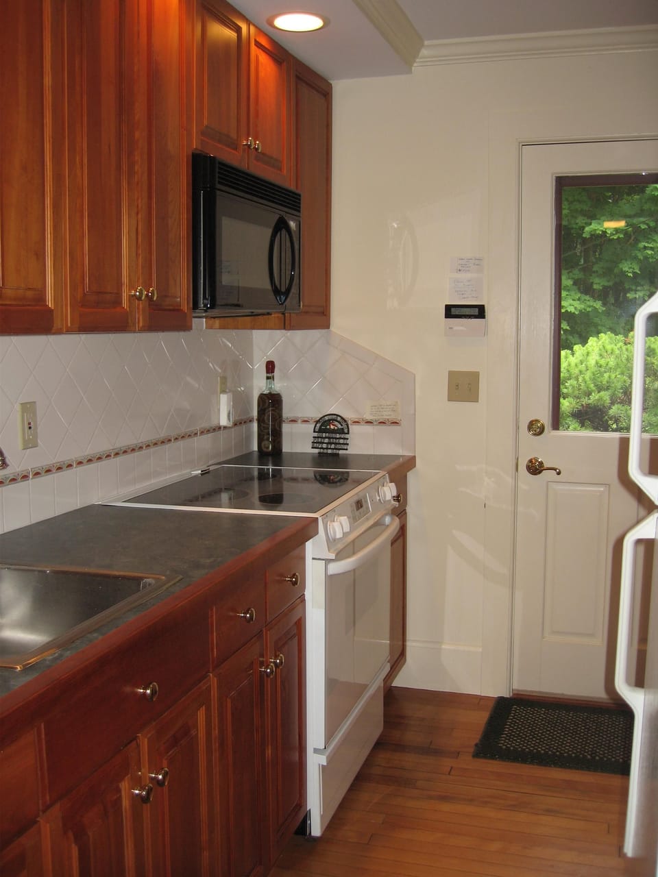 Annex Kitchen.  Door leads to large mahogany deck.
