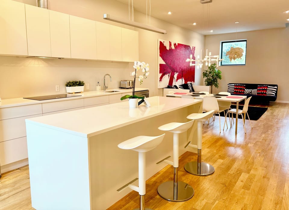 Boasting 18' x 36' with high ceilings, this airy urban home is super spacious!