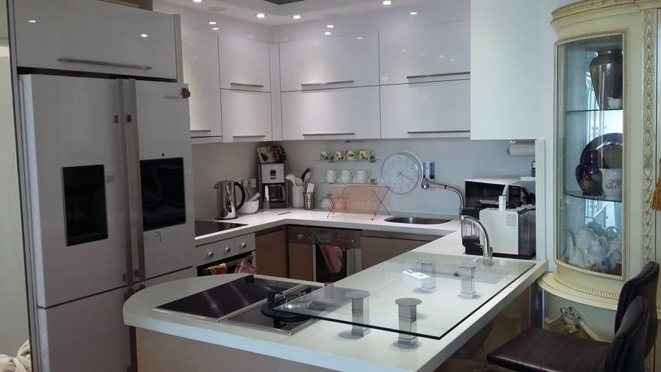 Open plan well stocked kitchen Nespresso Coffee point 
