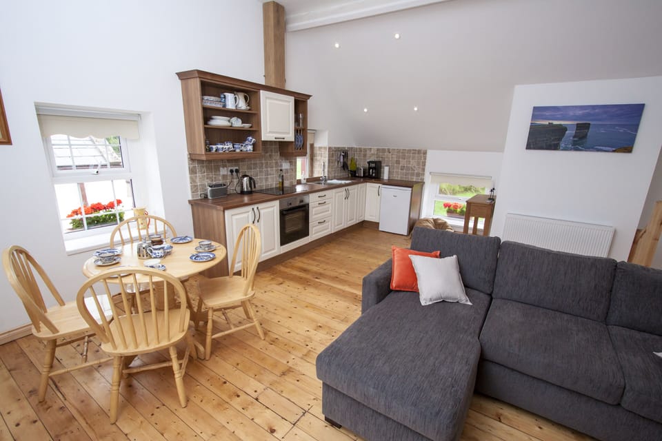A bright comfortable living room with wonderful views from the sofa