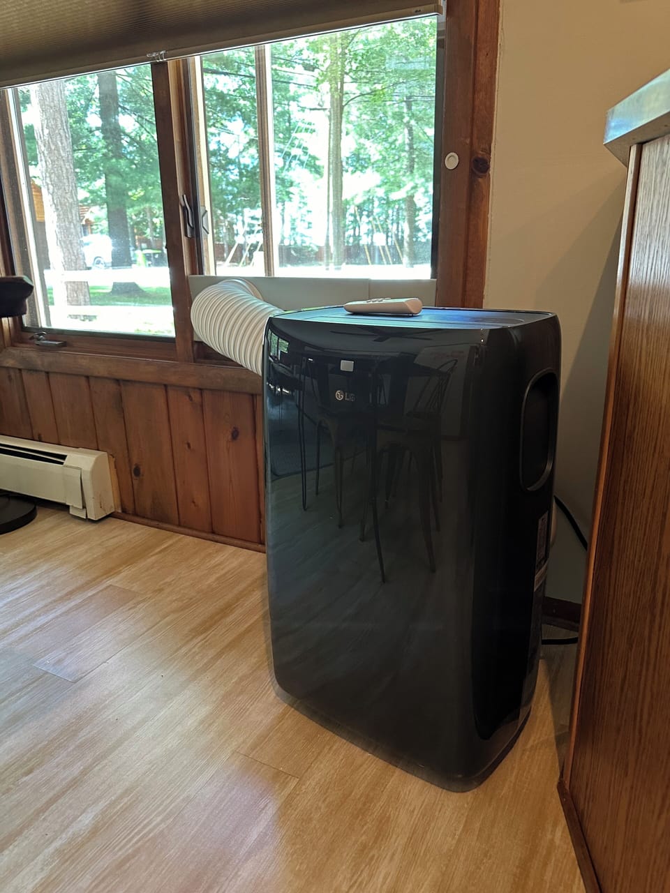 Portable air conditioning unit in main living area.