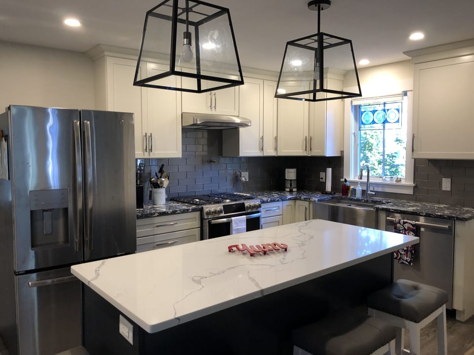 Beautiful new kitchen with new appliances including gas range 