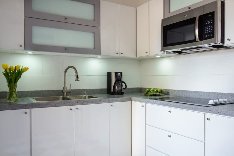Kitchen features stainless steel appliances 