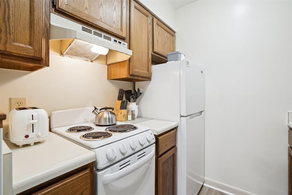 Cook your meals in this efficient kitchen.